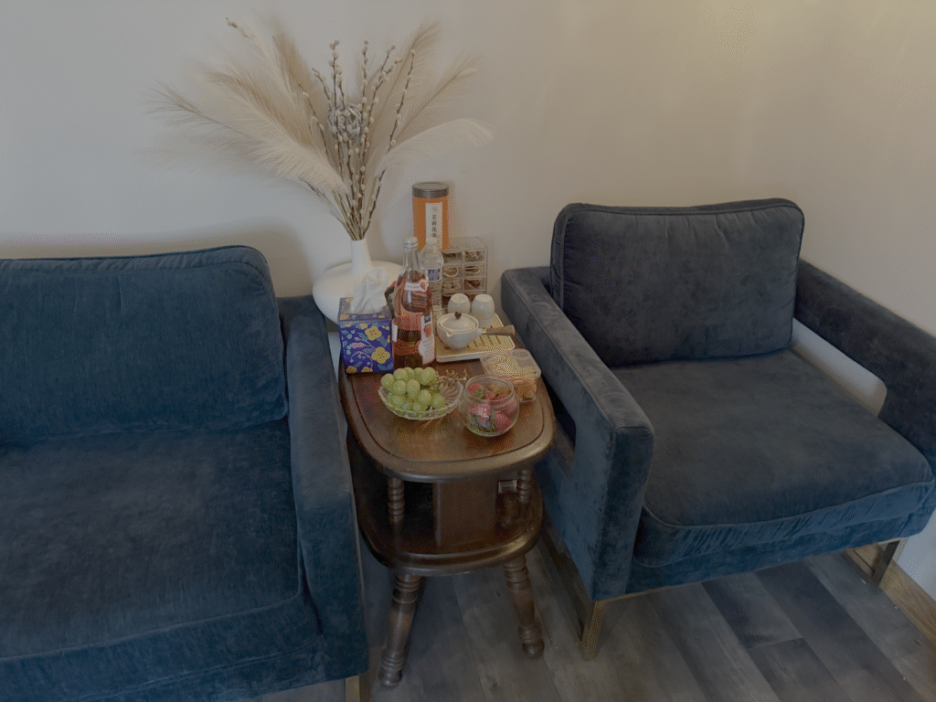 Little Break Spa waiting area with refreshments, tea service, and soft seating.